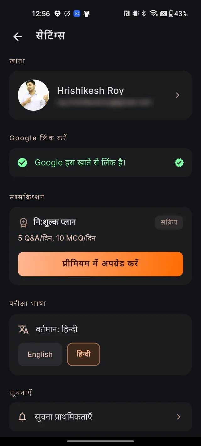 Settings screen showing the EXAM LANGUAGE section with English and Hindi chips